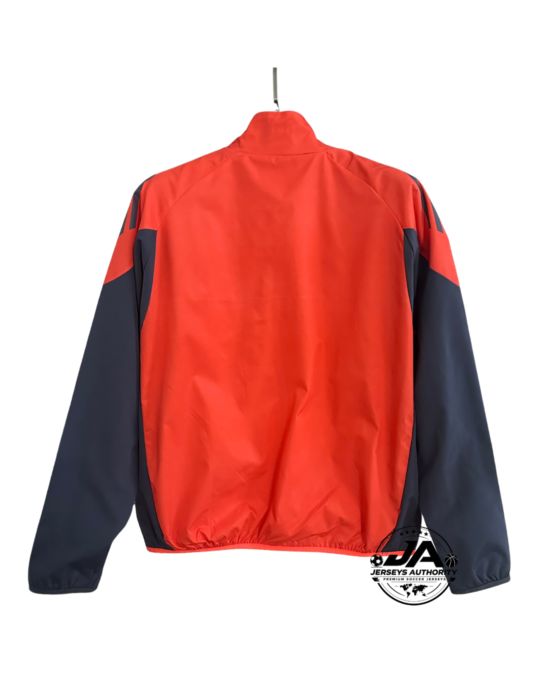 Man wearing Bayern Munich orange windbreaker