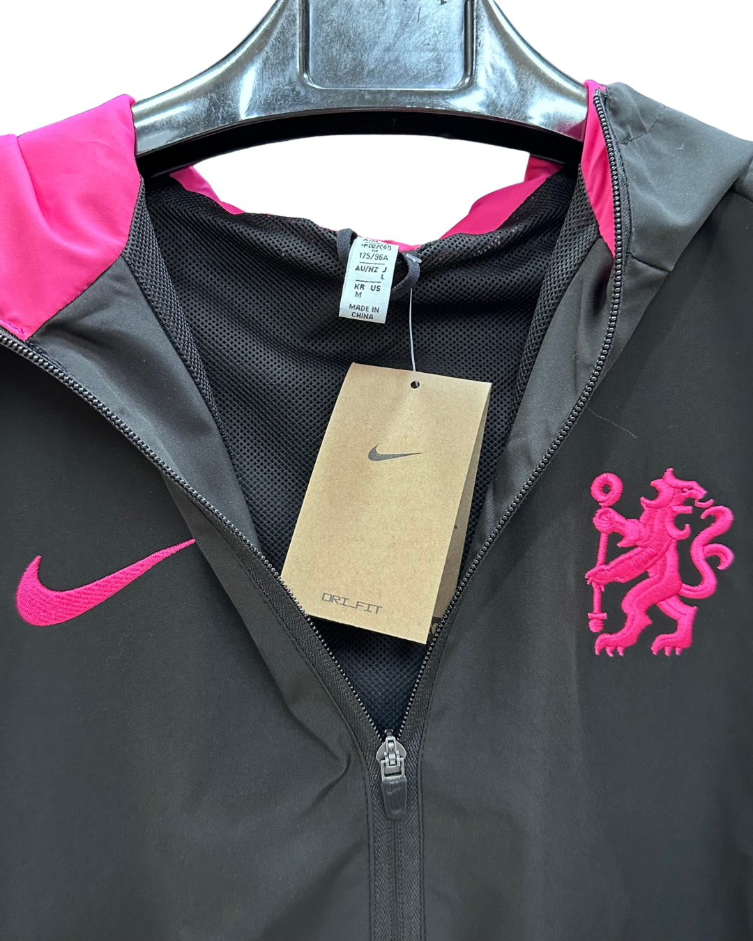 Chelsea windbreaker zipper and chest logo detail