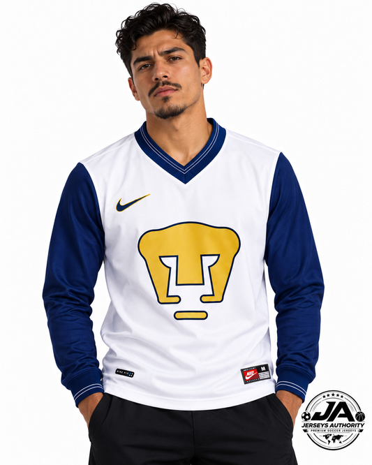 Male model wearing retro Pumas UNAM white and navy long sleeve jersey